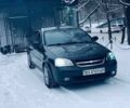Черный Шевроле Лачетти, объемом двигателя 1.6 л и пробегом 283 тыс. км за 2800 $, фото 1 на Automoto.ua
