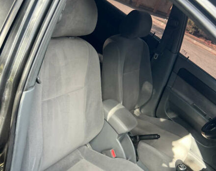 Черный Шевроле Лачетти, объемом двигателя 1.8 л и пробегом 248 тыс. км за 4250 $, фото 19 на Automoto.ua