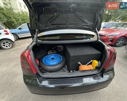 Черный Шевроле Лачетти, объемом двигателя 1.6 л и пробегом 252 тыс. км за 5700 $, фото 25 на Automoto.ua