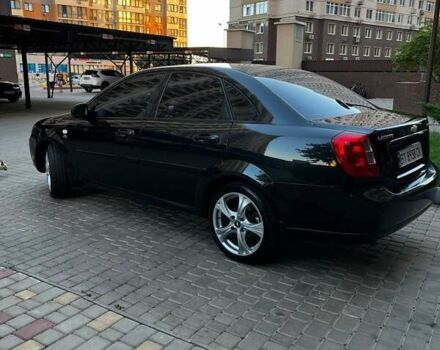 Черный Шевроле Лачетти, объемом двигателя 1.8 л и пробегом 131 тыс. км за 6400 $, фото 15 на Automoto.ua