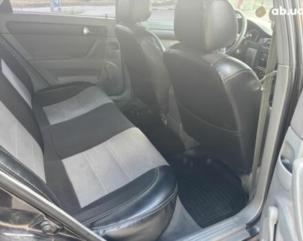 Черный Шевроле Лачетти, объемом двигателя 1.8 л и пробегом 226 тыс. км за 3490 $, фото 15 на Automoto.ua