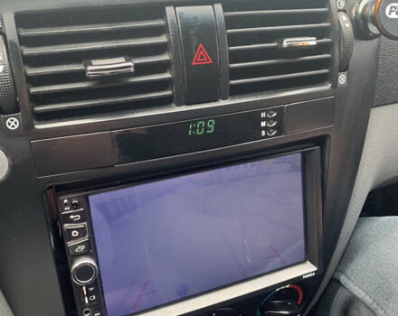 Черный Шевроле Лачетти, объемом двигателя 1.6 л и пробегом 174 тыс. км за 5500 $, фото 60 на Automoto.ua