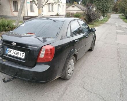 Черный Шевроле Лачетти, объемом двигателя 1.8 л и пробегом 200 тыс. км за 2100 $, фото 2 на Automoto.ua