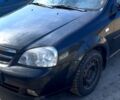 Черный Шевроле Лачетти, объемом двигателя 1.8 л и пробегом 280 тыс. км за 2600 $, фото 1 на Automoto.ua