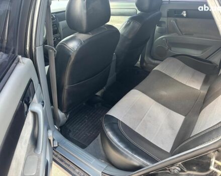 Черный Шевроле Лачетти, объемом двигателя 1.8 л и пробегом 226 тыс. км за 3490 $, фото 13 на Automoto.ua