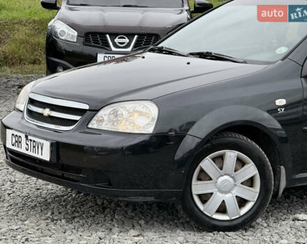 Черный Шевроле Лачетти, объемом двигателя 1.8 л и пробегом 202 тыс. км за 3999 $, фото 10 на Automoto.ua