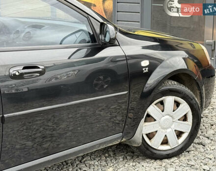 Черный Шевроле Лачетти, объемом двигателя 1.8 л и пробегом 202 тыс. км за 3999 $, фото 21 на Automoto.ua