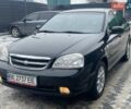 Черный Шевроле Лачетти, объемом двигателя 1.8 л и пробегом 224 тыс. км за 5500 $, фото 1 на Automoto.ua