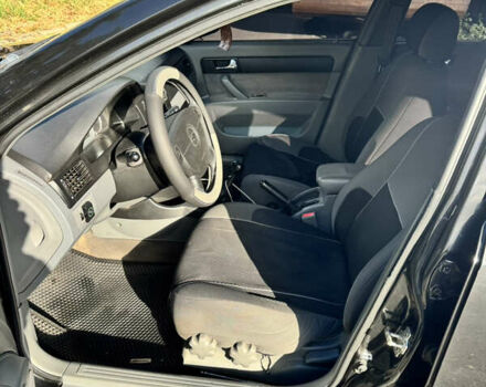 Черный Шевроле Лачетти, объемом двигателя 1.8 л и пробегом 251 тыс. км за 3900 $, фото 10 на Automoto.ua