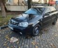 Черный Шевроле Лачетти, объемом двигателя 1.8 л и пробегом 380 тыс. км за 4300 $, фото 1 на Automoto.ua