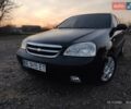 Черный Шевроле Лачетти, объемом двигателя 1.8 л и пробегом 244 тыс. км за 4200 $, фото 1 на Automoto.ua