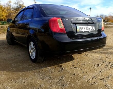 Черный Шевроле Лачетти, объемом двигателя 1.6 л и пробегом 200 тыс. км за 5300 $, фото 3 на Automoto.ua