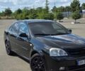Черный Шевроле Лачетти, объемом двигателя 1.8 л и пробегом 250 тыс. км за 4900 $, фото 1 на Automoto.ua