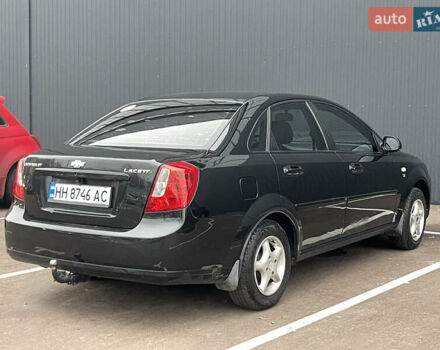 Черный Шевроле Лачетти, объемом двигателя 1.8 л и пробегом 170 тыс. км за 4400 $, фото 5 на Automoto.ua