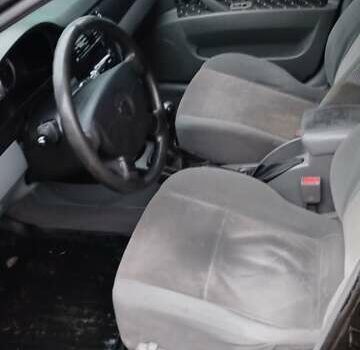 Черный Шевроле Лачетти, объемом двигателя 1.6 л и пробегом 270 тыс. км за 3350 $, фото 3 на Automoto.ua