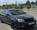 Черный Шевроле Лачетти, объемом двигателя 1.8 л и пробегом 250 тыс. км за 4899 $, фото 1 на Automoto.ua