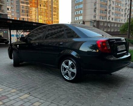 Черный Шевроле Лачетти, объемом двигателя 1.8 л и пробегом 131 тыс. км за 6400 $, фото 17 на Automoto.ua