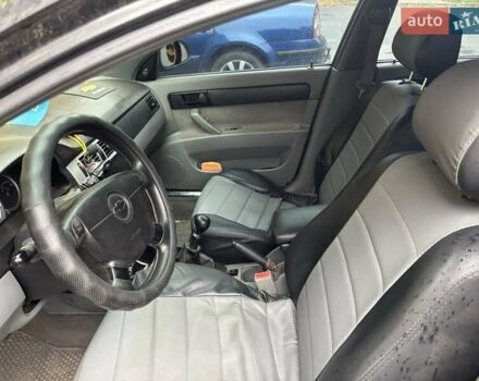 Черный Шевроле Лачетти, объемом двигателя 1.6 л и пробегом 230 тыс. км за 3900 $, фото 3 на Automoto.ua