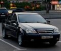 Черный Шевроле Лачетти, объемом двигателя 1.8 л и пробегом 348 тыс. км за 4000 $, фото 1 на Automoto.ua