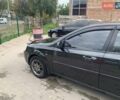 Черный Шевроле Лачетти, объемом двигателя 1.8 л и пробегом 150 тыс. км за 4499 $, фото 2 на Automoto.ua