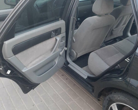 Черный Шевроле Лачетти, объемом двигателя 1.8 л и пробегом 202 тыс. км за 4999 $, фото 14 на Automoto.ua