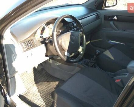 Чорний Шевроле Лачетті, об'ємом двигуна 1.8 л та пробігом 208 тис. км за 5000 $, фото 4 на Automoto.ua