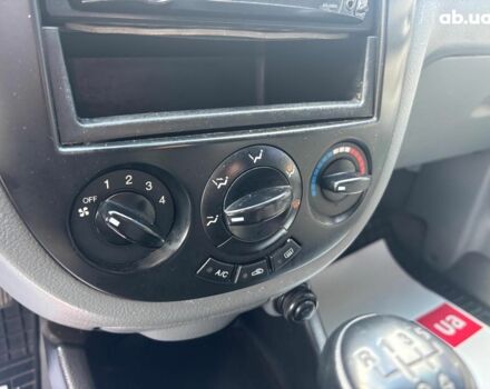 Черный Шевроле Лачетти, объемом двигателя 1.8 л и пробегом 226 тыс. км за 3490 $, фото 19 на Automoto.ua