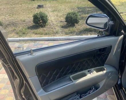 Черный Шевроле Лачетти, объемом двигателя 1.6 л и пробегом 156 тыс. км за 6100 $, фото 10 на Automoto.ua