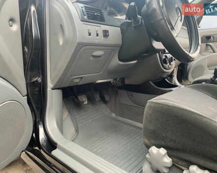 Черный Шевроле Лачетти, объемом двигателя 1.6 л и пробегом 174 тыс. км за 5500 $, фото 38 на Automoto.ua