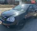Черный Шевроле Лачетти, объемом двигателя 1.6 л и пробегом 604 тыс. км за 4000 $, фото 1 на Automoto.ua