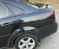 Черный Шевроле Лачетти, объемом двигателя 1.8 л и пробегом 200 тыс. км за 3800 $, фото 6 на Automoto.ua