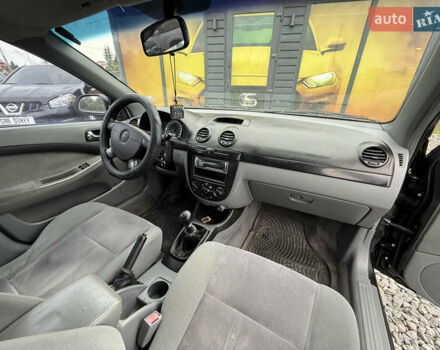 Черный Шевроле Лачетти, объемом двигателя 1.8 л и пробегом 202 тыс. км за 3999 $, фото 24 на Automoto.ua