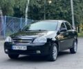 Черный Шевроле Лачетти, объемом двигателя 1.8 л и пробегом 207 тыс. км за 5216 $, фото 1 на Automoto.ua