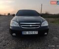 Черный Шевроле Лачетти, объемом двигателя 1.8 л и пробегом 244 тыс. км за 4200 $, фото 3 на Automoto.ua