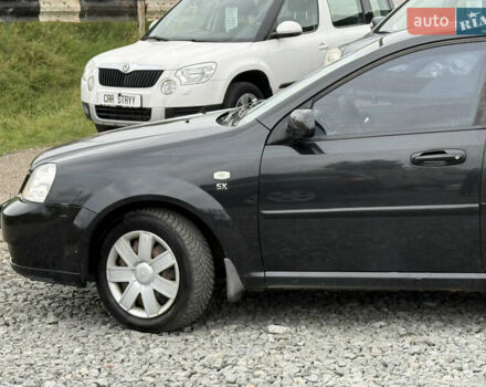 Черный Шевроле Лачетти, объемом двигателя 1.8 л и пробегом 202 тыс. км за 3999 $, фото 13 на Automoto.ua