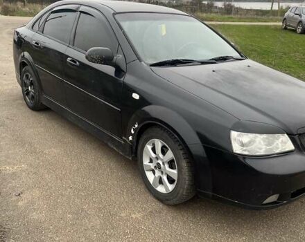 Черный Шевроле Лачетти, объемом двигателя 1.6 л и пробегом 300 тыс. км за 3300 $, фото 1 на Automoto.ua