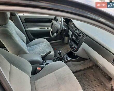 Черный Шевроле Лачетти, объемом двигателя 1.6 л и пробегом 246 тыс. км за 3999 $, фото 3 на Automoto.ua