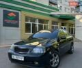 Черный Шевроле Лачетти, объемом двигателя 1.8 л и пробегом 218 тыс. км за 4850 $, фото 1 на Automoto.ua