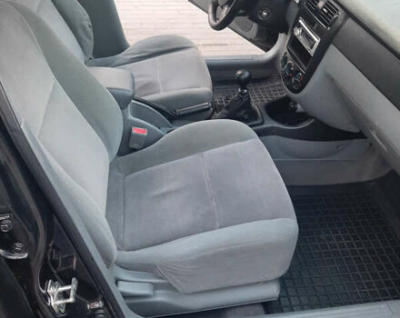 Черный Шевроле Лачетти, объемом двигателя 1.8 л и пробегом 202 тыс. км за 4999 $, фото 23 на Automoto.ua