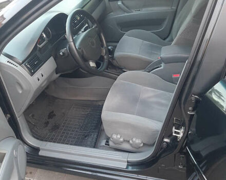 Черный Шевроле Лачетти, объемом двигателя 1.8 л и пробегом 202 тыс. км за 4999 $, фото 13 на Automoto.ua