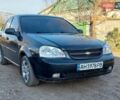 Черный Шевроле Лачетти, объемом двигателя 1.6 л и пробегом 300 тыс. км за 3000 $, фото 1 на Automoto.ua