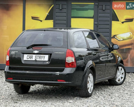 Черный Шевроле Лачетти, объемом двигателя 1.8 л и пробегом 202 тыс. км за 3999 $, фото 14 на Automoto.ua
