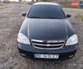 Черный Шевроле Лачетти, объемом двигателя 1.8 л и пробегом 244 тыс. км за 4200 $, фото 4 на Automoto.ua
