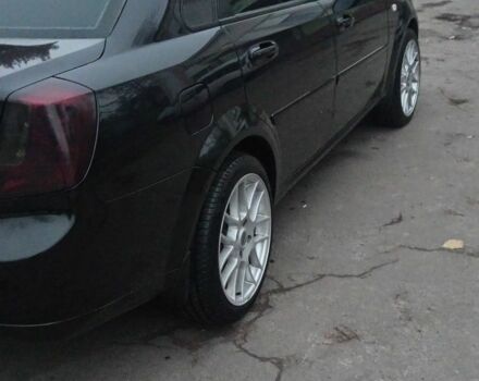 Черный Шевроле Лачетти, объемом двигателя 1.6 л и пробегом 138 тыс. км за 5500 $, фото 4 на Automoto.ua