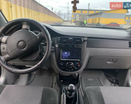 Черный Шевроле Лачетти, объемом двигателя 1.6 л и пробегом 174 тыс. км за 5500 $, фото 39 на Automoto.ua