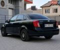 Черный Шевроле Лачетти, объемом двигателя 1.6 л и пробегом 220 тыс. км за 3650 $, фото 1 на Automoto.ua