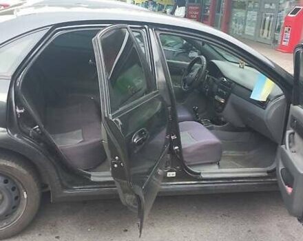 Черный Шевроле Лачетти, объемом двигателя 1.8 л и пробегом 170 тыс. км за 4800 $, фото 1 на Automoto.ua