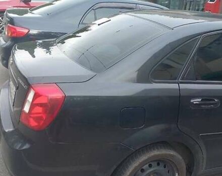 Черный Шевроле Лачетти, объемом двигателя 1.8 л и пробегом 170 тыс. км за 4800 $, фото 3 на Automoto.ua