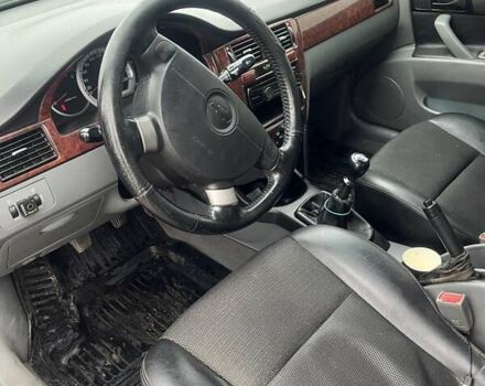 Черный Шевроле Лачетти, объемом двигателя 1.6 л и пробегом 300 тыс. км за 3300 $, фото 3 на Automoto.ua