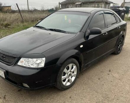 Черный Шевроле Лачетти, объемом двигателя 1.6 л и пробегом 300 тыс. км за 3300 $, фото 2 на Automoto.ua